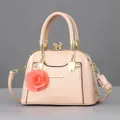 Pink patent leather shell bag with 3D rose decoration and crystal rotating clasp - Glossy Light Pink