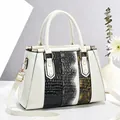 Patchwork glossy leather handbag featuring crocodile and snake textures with gold hardware - White