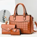 Three-piece set of caramel orange patent leather handbags with stylish quilted texture - Tote Clutch And Card Holder Set / Caramel Orange