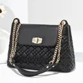 Quilted black leather shoulder bag with gold chain strap and rhinestone square lock - Black