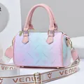 Gradient pink and blue Boston style handbag with wide Venus strap and floral texture - Pink