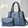 Retro blue leather 3-piece bag set featuring a large tote and matching envelope wallet - Blue