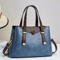 Vintage blauwe handtas met grote capaciteit met bruine handvatten en gouden details - Blauw