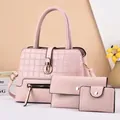 Detail of pink 3-piece set women's handbag with checkered embossing and gold hardware - Pink