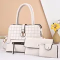 Three-piece beige faux leather tote bag set with quilted texture and gold hardware - White