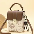 Minimalist beige crossbody cell phone bag with dark brown leather straps and metal lock - Off White