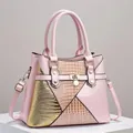 Elegant pink and gold crocodile texture handbag with adjustable shoulder strap - Pink