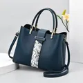 Large capacity dark blue leather handbag with snakeskin accent and gold hardware - Blue