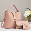 Pink three-piece women's crossbody bag set with pebble faux leather and gold hardware - Pink
