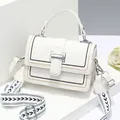 Chic white crossbody bag with geometric pattern wide strap and contrast stitching - White
