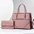 Detail view of pink PU leather tote and matching wallet with geometric stitching - Pink