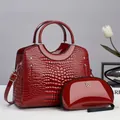 Fashionable red crocodile pattern glossy leather handbag and clutch two-piece set - Red