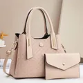 Two-piece set of woven texture handbag and envelope clutch in elegant beige with metal charm - Khaki