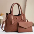 Caramel brown woven texture tote bag with matching envelope pouch and gold metal hardware - Brown