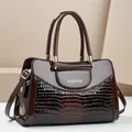 Deep brown faux crocodile skin shoulder bag with shiny patent leather and golden hardware - Coffee