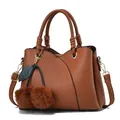 Brown lychee grain PU leather tote bag with a cherry charm and adjustable shoulder strap - Earthy Yellow