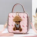 Pink rectangular crossbody bag with cartoon bear and reindeer patterns in PVC leather - Pink