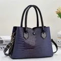 Elegant blue octopus texture tote bag with black patent handles and shoulder strap - Blue