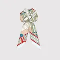Close-up of geometric pattern on silk hair scarf scrunchie with horseshoe motifs - Red Blue Patchwork Geometric (2)