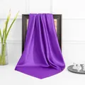 Detail of elegant dark purple satin scarf draped on a vintage frame with flowers - Purple