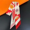 Detail of floral skinny scarf showing high-quality polyester texture and brand label - Red White Pink Large Floral (G) Logo (C270-3)