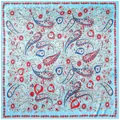 Blue paisley square scarf with red heart patterns in a premium silk-like flat lay view - Sky Blue