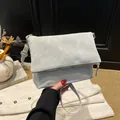 Chic light grey square envelope bag with matte leather finish and gold hardware accents - One Size / Gray