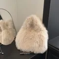 Chic beige faux fox fur bucket bag with a soft plush texture and integrated handle - With Pendant / Apricot