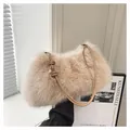 Plush faux fur shoulder bag in apricot beige with elegant leather handles and gold rings - With Pendant / Apricot