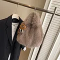 Brown fluffy faux fur tote bag with cute plush pendant on a display hanger - With Pendant / Khaki