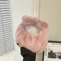Soft light pink plush handbag with decorative knot design for autumn and winter fashion - Pink