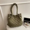 Army green quilted puffer tote bag with knotted handles for stylish urban commuting - Green