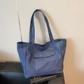 Blue plaid nylon shoulder bag with spacious design and rectangular front pocket - Blue