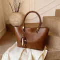 Retro deep brown large capacity tote bag with dual handles and beaded tassel charm - With Pendant / Yellow Brown