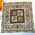 Detail of 90cm hand-rolled silk scarf featuring baroque floral prints and Greek key border - Hand-Rolled Edge / Coffee Edge