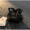 Glossy black quilted backpack with golden chain straps and drawstring details - One Size / Black