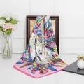 Bohemian silk scarf with colorful feather patterns and artistic unicorn illustration - Pink