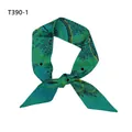 Detailed shot of knotted dark green silk twilly scarf with abstract artistic patterns - T390-1 / 100cm