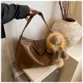 Retro brown large capacity leather tote bag with stylish plush fur pendant charm - With Pendant / Brown