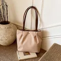 Waterproof nylon tote bag in beige with dark brown shoulder straps and gold logo - Khaki