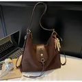 Retro dark brown large tote bag in faux suede with a floral metal buckle and tassel - With Pendant / Coffee