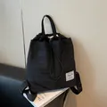 Sac à dos en nylon noir résistant à l'eau avec cordon de serrage et grande capacité - Taille unique / Noir
