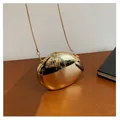 Chic gold egg-shaped metal clutch with mirror finish and elegant chain strap for women - Light gold