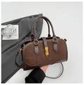 Deep brown faux suede tote bag with metal twist lock and minimalist office styling - One Size / Coffee