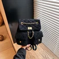Quilted black velvet backpack featuring golden chain straps and elegant metal lock - One Size / Black