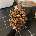 Mini leopard print backpack with diamond quilting and gold chain in leopard variant - One Size / Leopard Brown