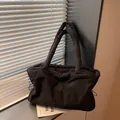 Quilted black down tote bag with nylon finish and long shoulder handles - Quilted Puffer Style / Black