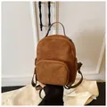 Detail of mini leopard print backpack featuring brown suede texture and golden zippers - One Size / Brown