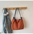 Caramel orange corduroy crossbody bag with stylish black and white checkered strap - Orange Red