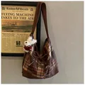 Retro brown plaid wool tote bag with a cute plush puppy pendant and bow drawstring detail - With Pendant / Brown Plaid